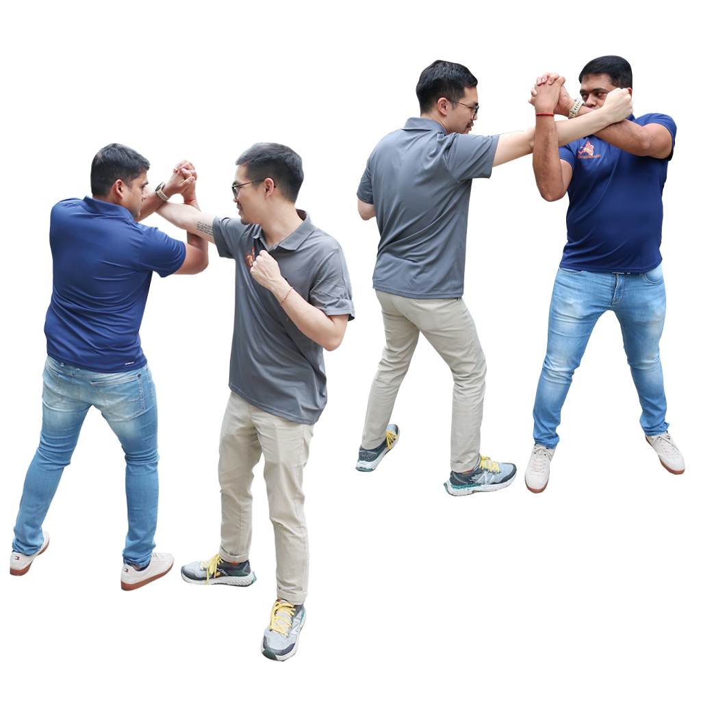 Martial artist performing Varma Kuthu Pirippu technique with focused posture.